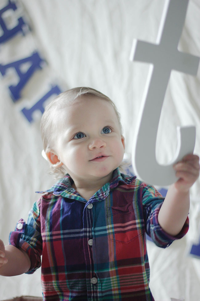 Child with letter T