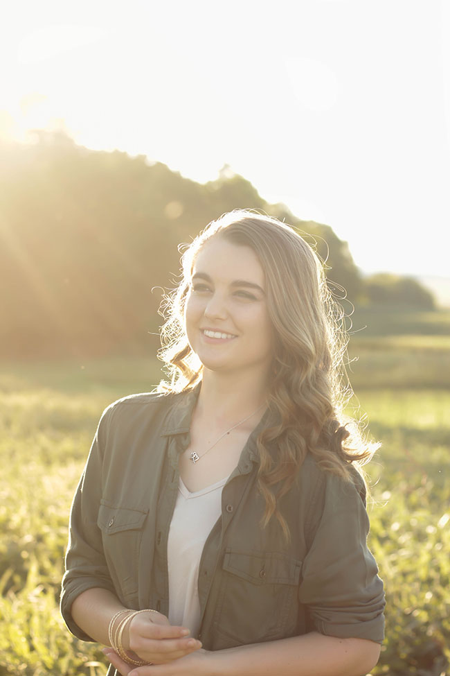 Girl smiling in sunlight