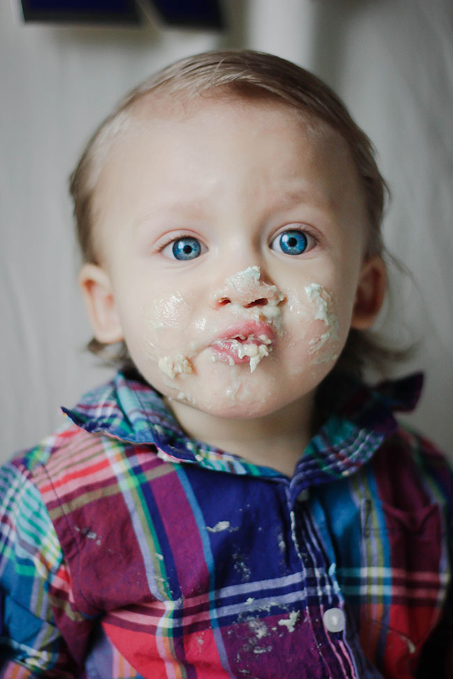 Baby posing with cake
