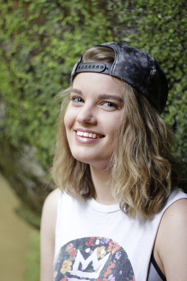 Girl wearing baseball hat