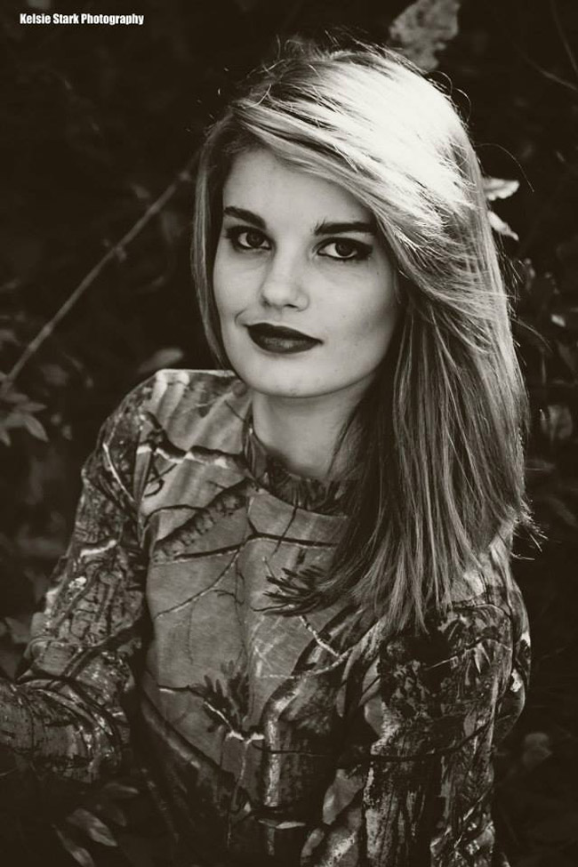Black and white photo of girl outdoors