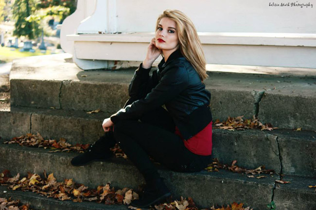 Girl sitting on stairs